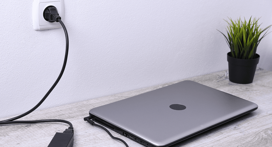 Laptop on desk with reliable power — placeholder